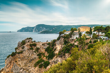 Fototapeta na wymiar Buildings standing on high hill above Mediterranean sea