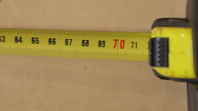 Using measuring tape