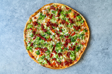 Vegetarian Pizza with Broccoli and Dried Tomatoes.