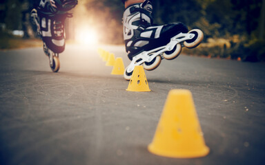 Roller skating slalom around yellow cones