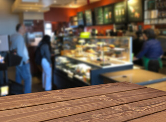 Perspective view of wooden table corner in cafe or coffee shop