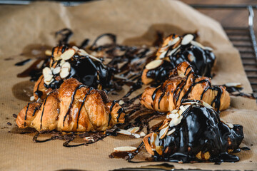 croissants with chocolate and honey on the table with.