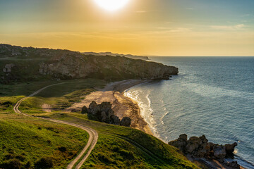 Amazing landscape with sea bay, sand beach and coastal hills and rocks on summer evening at sunset. Trip to seaside. General's beaches or Generalskie Plyazhi or coast of thousand bays, Crimea © Tatyana_Andreyeva