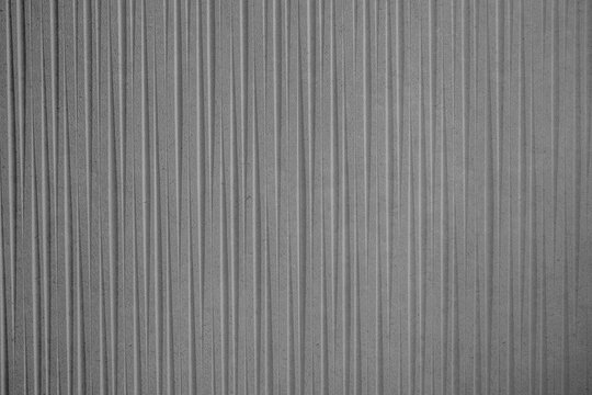 Grey wall with striped decoration ideal for textures and patterns