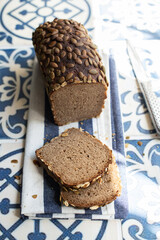 Healthy rye sourdough bread with pumpkin seeds. Healthy eating and artisanal bread baking concept.