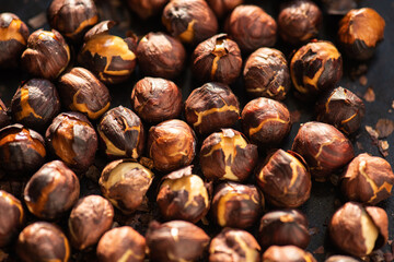 Hazelnuts roasted in an oven.