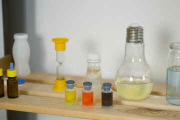 Home school chemistry class laboratory with reagents, jars, flasks and test tubes. Equipment for experiments. Homeschooling, education, science concept. Chemical classroom.