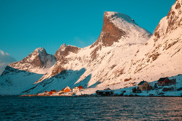 Norway lofoten islands with red houses snow and mountains