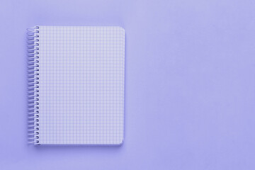 Trendy very peri color of the year 2022, violet blue, lavender open spiral notebook with blank empty sheets with copy space