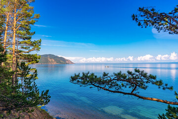 Great Baikal Trail. Popular route along lake Baikal shore from Listvyanka to Big Koty. Lake Baikal coast, hill with forest, water bay. Summer travel, discovery of beauty of Earth. Siberia, Russia © Tatyana_Andreyeva
