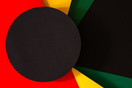 Abstract geometric black, red, yellow, green color background. Black History Month background with copy space for text