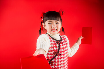 A Chinese girl is happy to celebrate the Spring Festival.