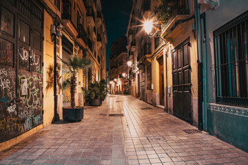 Fototapeta na wymiar quaint street view at night in Valencia Spain