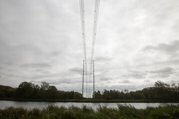 Modern power lines across the canal