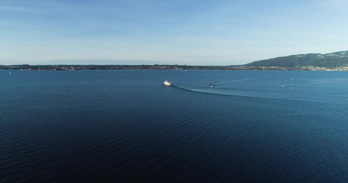 Aerial view of a sailing boat navigating in Lake Constance, Switzerland.