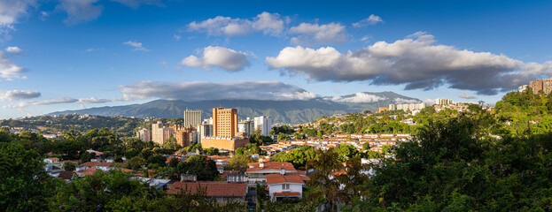 Panoramic view of Caracas City at sunset from Cota Mil. Venezuela