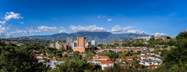 Naklejka premium Panoramic view of Caracas City at sunset from Cota Mil. Venezuela
