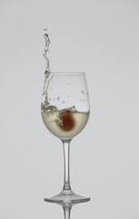 glass of white wine on the move