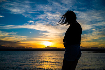 Dreamer woman on the seashore