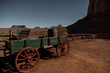 Fototapeta na wymiar Olijato Monument Valley, AZ, USA An old wagon exhibited at the Goulding's Lodge