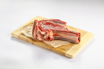 Raw bones for cooking over board