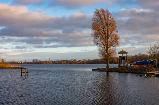 View of recreational lake Gaasperplas, south-east of Amsterdam, by sunset