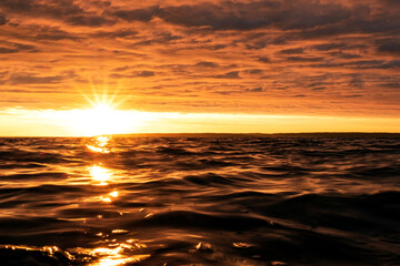 Fototapeta na wymiar sunset and clouds on the Baltic sea