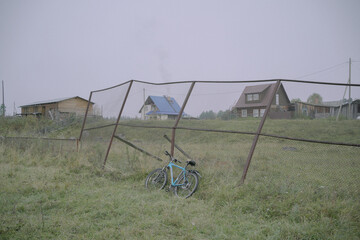 Bike lost and forgotten in unknown village in Russia
