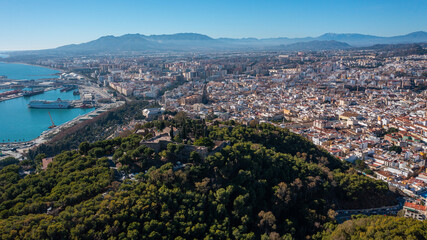 Fototapeta na wymiar Aerial photo from drone to of Malaga Gibralfaro castle in the background a panoramic view of the city of Malaga. Malaga.Spain,Costa del sol, Andalusia (Series)