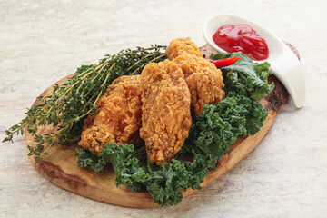 Crispy chicken wings with tomato ketchup
