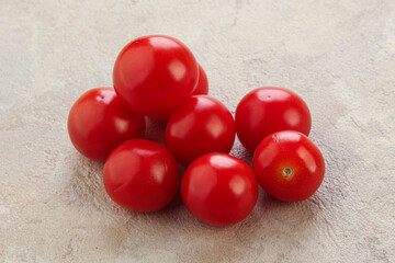 Ripe juicy cherry tomatoes heap