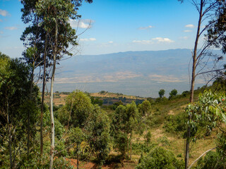 Fototapeta na wymiar Aerial view of valley amidst mountains in Iten Township in rural Kenya