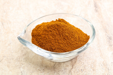 Dry Paprika powder in the bowl