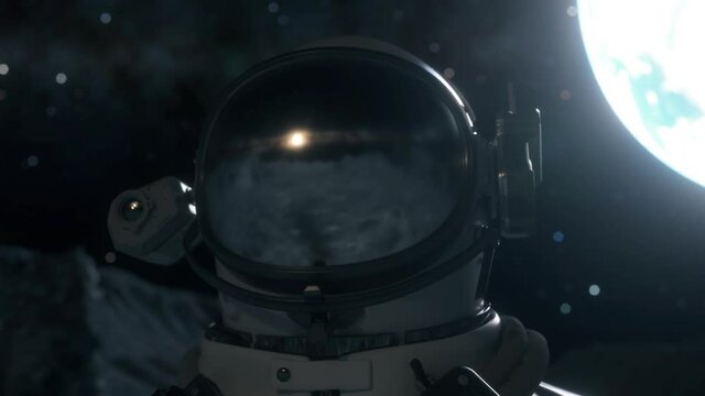 Astronaut walks on surface of the planet. Closeup view of space suit helmet