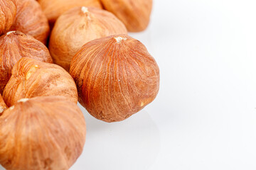macro hazelnuts nuts on a white background