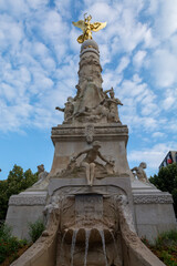 Fototapeta premium Walking on streets in central part of old French city Reims with famous champagne houses, France