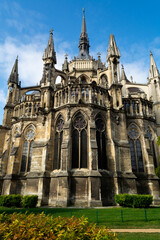 View from back side on gothic Roman Catholic cathedral church Notre-Dame in central part of old French city Reims, France