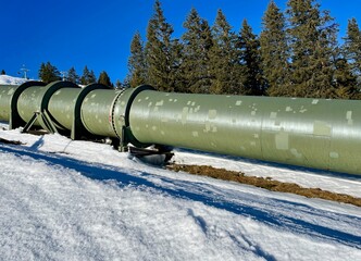 Water pipeline in the Austrian Alps in winter.