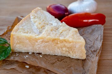 Cheese collection, piece of matured cow cheese pasmesan parmigiano reggiano made from cow milk