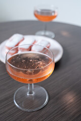 Symbols of Reims - glasses of rose brut champagne and rose biscuits