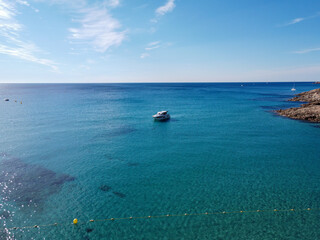 Summer holidays on French Riviera, aerial view on rocks and sandy beach Escalet near Ramatuelle and Saint-Tropez, Var, France