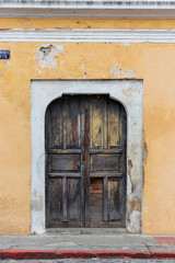 Fototapeta na wymiar Old colonial door in antigua guatemala , colonial style architecture
