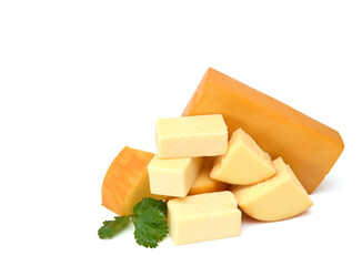 Cubes of cheddar cheese isolated on white 
