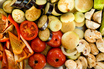 top view of slices of various raw chopped vegetables