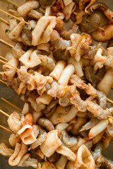 Close-up top view of the raw seafood kebab