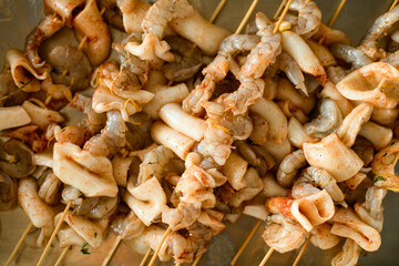 Top view of the raw seafood kebab