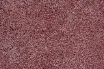 Hintergrund grober roter Putz