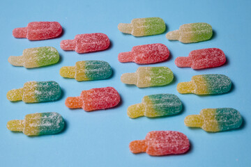Popsicle sugary candy pattern on blue