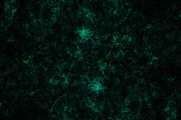 Scattered heavy grunge texture on a dark concrete wall surface