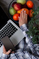 Business woman modern workplace with laptop and healthy food. Top view of business background